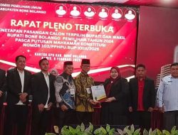 KPU Tetapkan Ismet Mile-Risman Tolingguhu Sebagai Bupati dan Wakil Bupati Terpilih