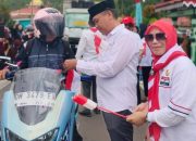 Camat Bone Ajak Warga Kibarkan Merah Putih